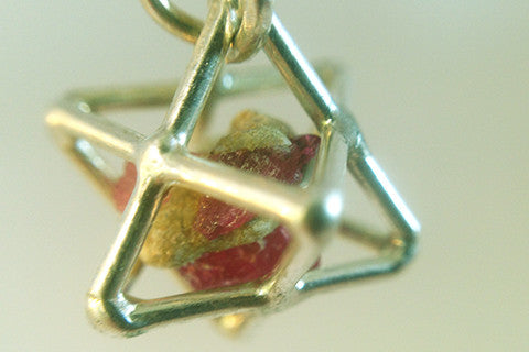 925 silver sacred geometry Tertra Pendant with raw ruby enclosed