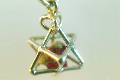 925 silver sacred geometry Tertra Pendant with raw ruby enclosed